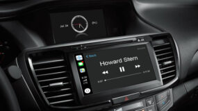 An audio system screen with Apple CarPlay